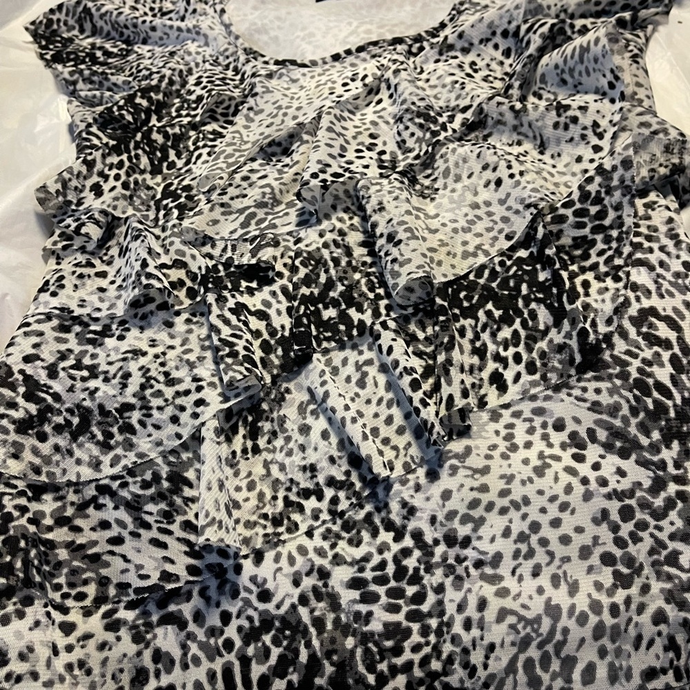 Animal print ruffle top short  sleeve size small